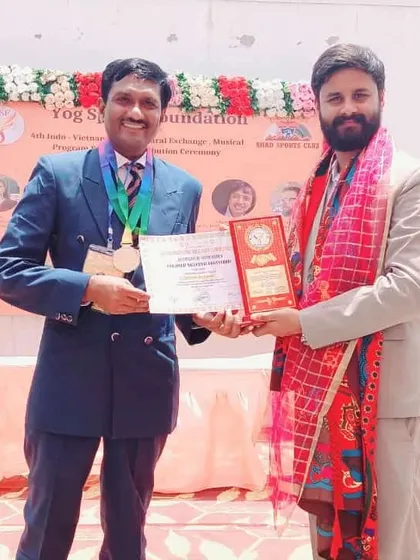Receiving an award for my contributions to the field of yoga. Such recognition reinforces our mission to spread authentic yogic knowledge.