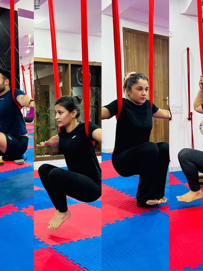The Utkatasana, or chair pose, takes on a new challenge in the hammock. This collage shows students building leg and core strength while suspended.