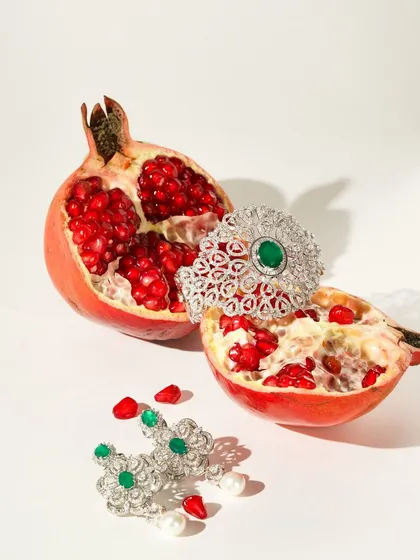 We love getting creative to capture a product's essence. By pairing this exquisite Sarte jewellery with the vibrant texture of a pomegranate, we created a unique, high-fashion image that highlights the piece's luxury and artistry.