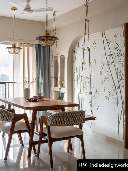 A hand-painted bamboo mural brings a sense of tranquility to this dining area. The delicate branches and small sparrows create a light, airy feel, perfectly complementing the wooden swing and turning the corner into a peaceful retreat.