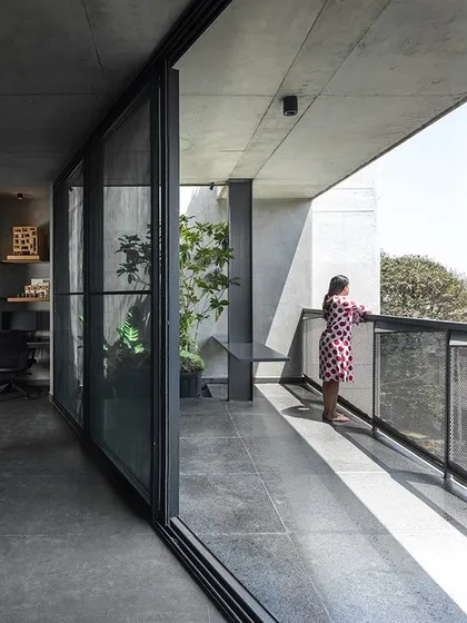 A deep balcony extends from our studio, providing a break-out space for the team. The large sliding glass doors create a seamless flow between the indoor workspace and this outdoor area, offering a place for fresh air and new perspectives.
