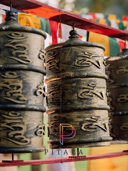 For a spiritual and serene wedding, we incorporated Tibetan prayer wheels into the decor, adding a layer of meaning and tranquility.