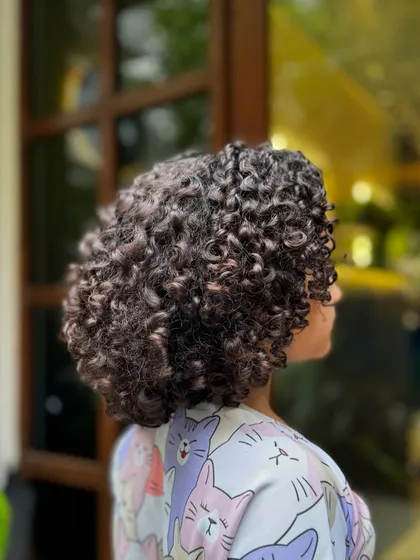 Born to be wild and curly! This little one got a fresh cut to shape her beautiful curls, making them bouncy, healthy, and easy for her parents to manage.