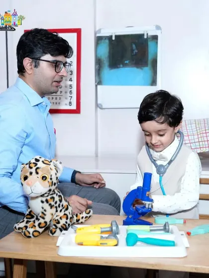 Another shot of our pretend-play doctor's office, a favorite among the kids.