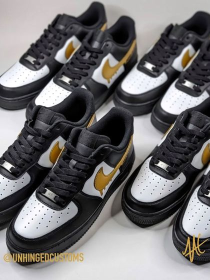 An army of Budweiser customs. I made four identical pairs for this corporate order, each with the same clean black, white, and gold design.