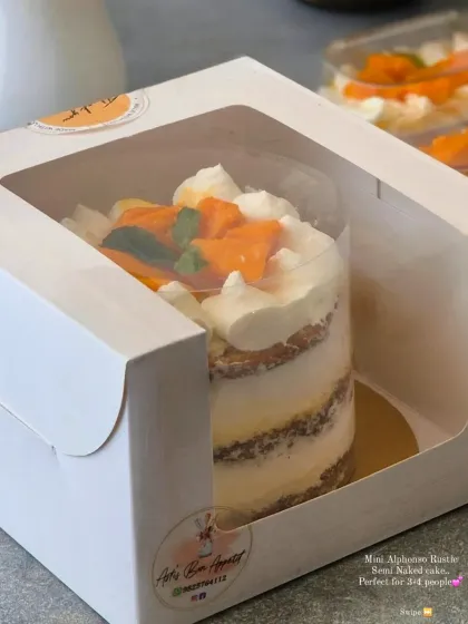 Here is my Mini Alphonso Semi-Naked Cake, perfectly packaged for gifting. It's an ideal size for 3-4 people to share and enjoy the taste of fresh mangoes.