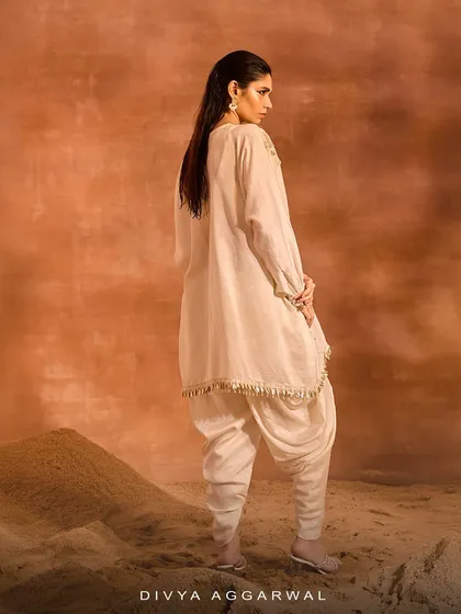 The back view of the Orion Kaftan Set, showcasing the fluid drape of the fabric and the unique silhouette of the dhoti pants.