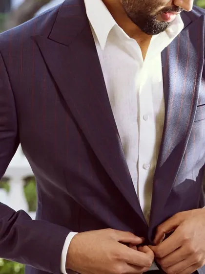 The subtle stripes and rich color of this linen jacket make it a timeless piece that will elevate your wardrobe.