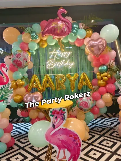 A Flamingo-themed party is a stylish and fun choice. I use a mix of tropical colors, flamingo cutouts, a green fringe backdrop, and a neon "Happy Birthday" sign to create a trendy, tropical vibe for the celebration.