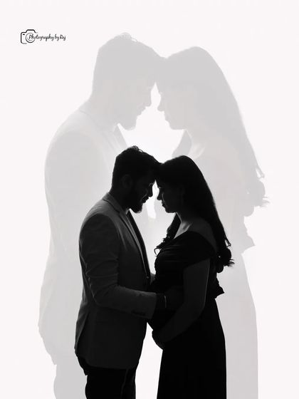 A double-exposure style silhouette, blending the profiles of the couple with a full-body silhouette.
