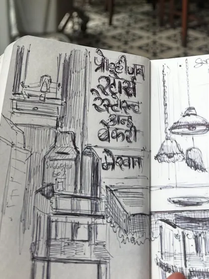 A close-up of the pen and ink sketch I did at SodaBottleOpenerWala, focusing on the Devanagari script on the wall. I love capturing these small, authentic details.