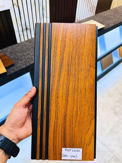 A classic teak wood finish on our new pattern fluted panel. The warm, natural wood look is timeless and adds a touch of elegance.