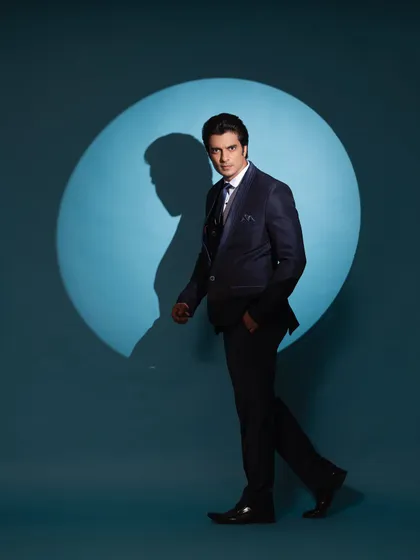 A dynamic shot of Gashmeer Mahajani, showing how a well-styled suit moves. The goal was a look that is both formal and full of personality.