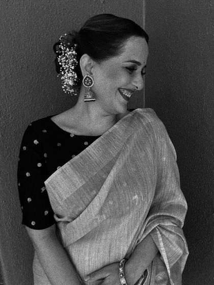 Another beautiful black and white shot, highlighting the traditional bun adorned with gajra.