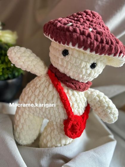 Our handmade mushroom toy, ready for an adventure. The soft chunky yarn makes it both durable and incredibly cuddly.