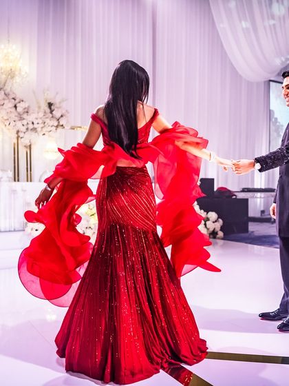 The joy of the first dance. The bride's gown was chosen not just for its beauty but also for its ability to move, creating a spectacular visual as she twirls on the dance floor.