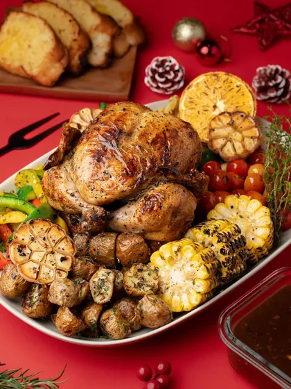 This is what a feast looks like. We styled and shot this entire Christmas spread, from the perfectly roasted chicken and sides to the festive props. This is the kind of high-quality imagery we create for restaurant menus and promotional campaigns.