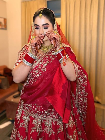 A playful moment captured. This shows that my bridal makeup is not just for pictures; it's for living and enjoying your special day to the fullest.