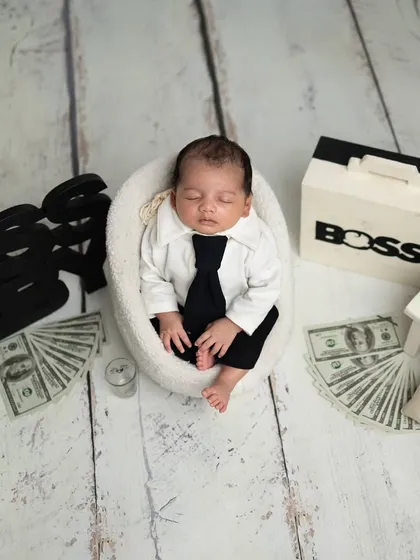 Another angle of our sleeping boss, showcasing the creative details of this popular newborn theme.