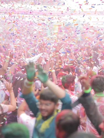 We know how to create an atmosphere of pure energy and celebration. This shot from a corporate Holi festival captures the peak of excitement, with a vibrant explosion of confetti over an engaged and happy crowd, demonstrating our skill in producing large-scale festive events.