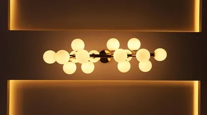 I believe lighting is the jewelry of a space. This contemporary molecular chandelier is an example of a statement piece that not only illuminates but also adds a touch of artistic elegance and sophistication to an interior.