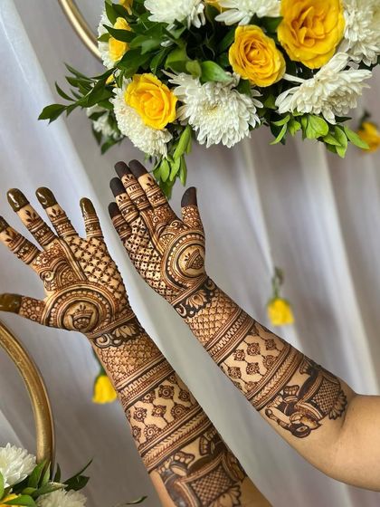 Another angle of the classic bridal design, showing the beautiful flow of the patterns from hand to arm.