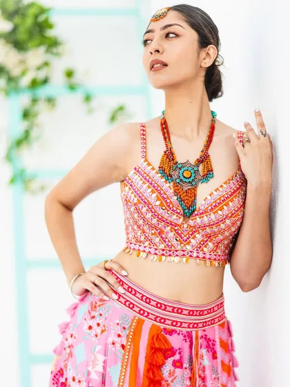 For this lookbook image, I focused on styling by pairing the outfit with a statement necklace. The pose is designed to highlight both the clothing and the accessories, showing potential customers how to complete the look.