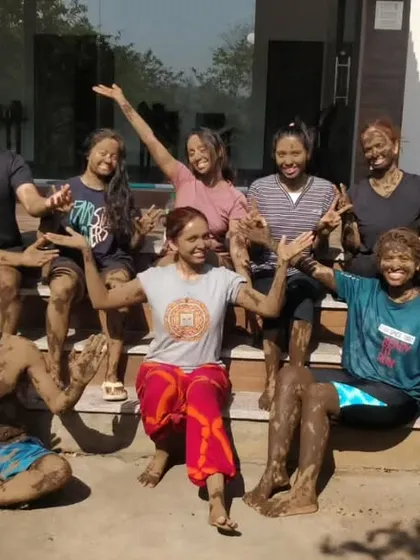 Our Mumbai YTTC participants covered in therapeutic mud during our unique Holi celebration.