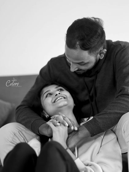 A beautiful black and white portrait capturing a loving gaze between the couple.