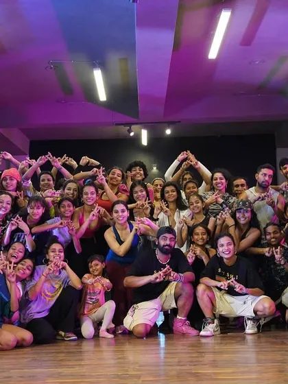 The full group from the collab intensive, buzzing with energy.