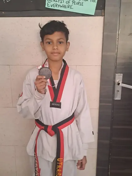 My student Utkarsh Chopra with his bronze medal from the 38th Sub Junior Delhi State Taekwondo Championship.