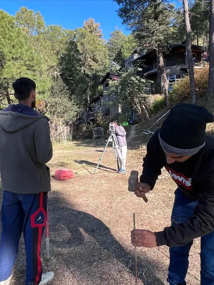 Precision is crucial when working with natural landscapes. My team uses surveying equipment to map out the site, a foundational step that informs every design decision for this upcoming project in the hills.