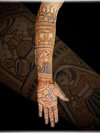 A full bridal arm design telling a story with a bride figure, auspicious kalash pots, and other traditional wedding symbols.