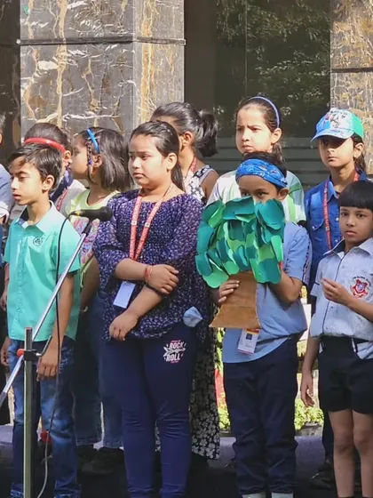 Students participate in a heartfelt Earth Day assembly, reflecting on the urgent need to protect our planet and the role they can play.