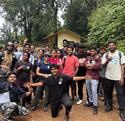 A group photo with our local guides at the Netravati trek base camp. Their expertise is key to a safe and enjoyable experience.