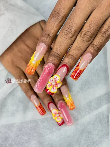A vibrant and playful set featuring multiple 3D techniques. I combined textured patterns, sculpted flowers with pearl centers, and glossy gel finishes in a warm color palette of orange, pink, and yellow.