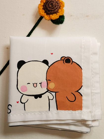 A sweet kiss on the cheek. This Bubu and Dudu handkerchief is perfect for showing your affection to your 'pookie'.
