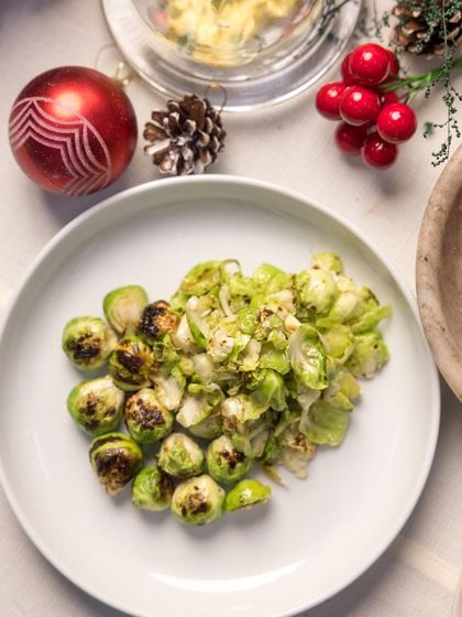 Charred Brussels sprouts, a simple yet elegant side dish that complements the richness of the holiday menu.