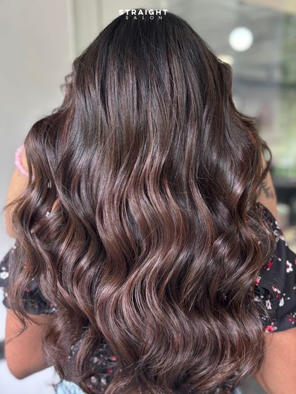 These flawless waves are the perfect way to show off a fresh color. The light reflects beautifully off the rich, dimensional tones.