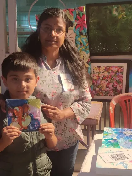 This "Kamala Ganesha" is from my Tiny Art series. It was wonderful to see this little 6x6 inch piece find a home with a young art admirer at Chitra Santhe.