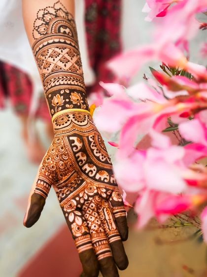 Another artistic shot of the elephant and lotus bridal henna, showing how the design looks from a different perspective.