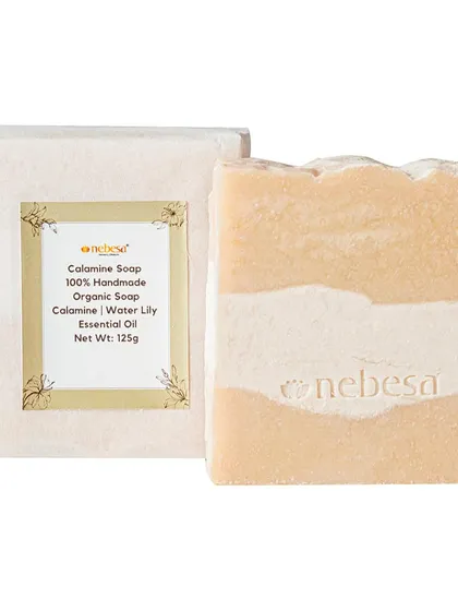 My Calamine Soap, shown here with its simple, elegant packaging. It is a 100% handmade organic soap infused with the gentle scent of water lily essential oil.