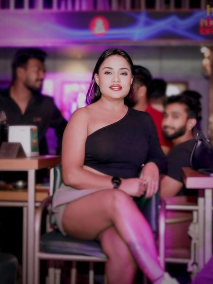 A candid shot of a guest enjoying the music. I focus on creating a comfortable and fun environment for everyone.