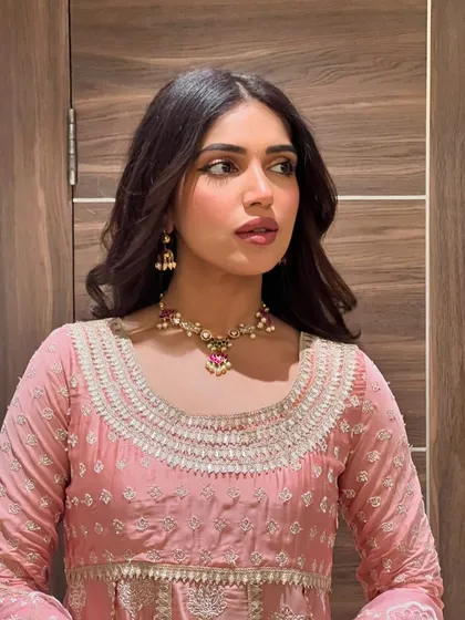 For Ganpati celebrations, I styled Bhumi Pednekar in this lovely pink anarkali suit. The delicate white embroidery and soft fabric make it a comfortable yet festive choice for a day of celebrations.