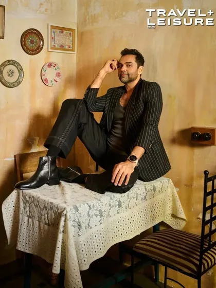A selection of looks from my cover shoot with Abhay Deol for Travel + Leisure. The styling ranged from casual athleisure by Onitsuka Tiger to sharp pinstripe blazers, showcasing a versatile wardrobe for the modern traveler.