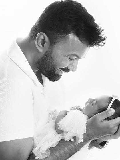 The look in a father's eyes as he holds his tiny baby girl for the first time is a moment of pure magic.