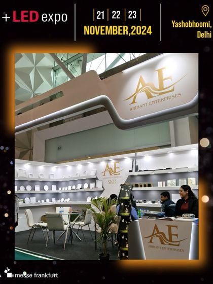 The Arihant Enterprises (AE) booth presents a clean, organized display of their lighting components and products.
