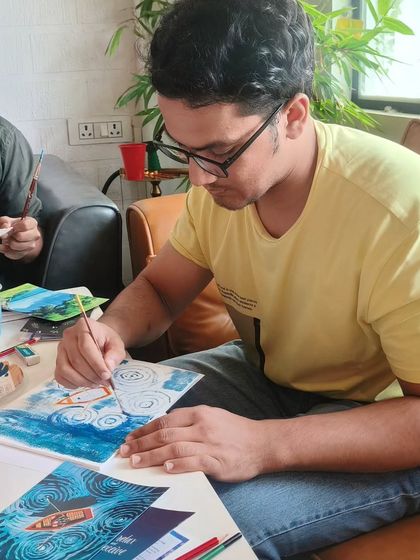 Totally focused on bringing his vision to life. It's so rewarding to see participants completely absorbed in their creative process.