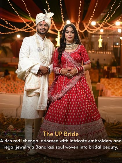 Here we feature a couple, with the bride embodying the grace of Uttar Pradesh. She wears a rich red Banarasi lehenga with detailed embroidery, paired with regal jewelry for a complete bridal look.