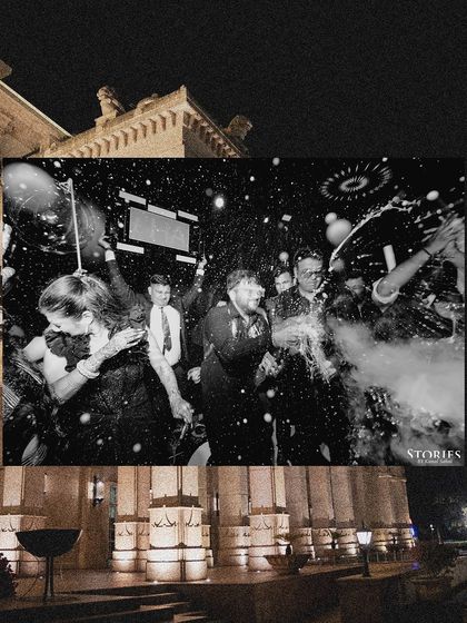 A black and white photo capturing the wild celebration of a champagne spray at the after-party.